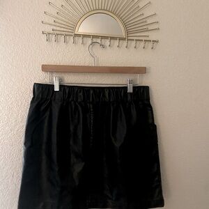Wild Fable, Black skirt, size medium, above the knee mid thigh, front pockets